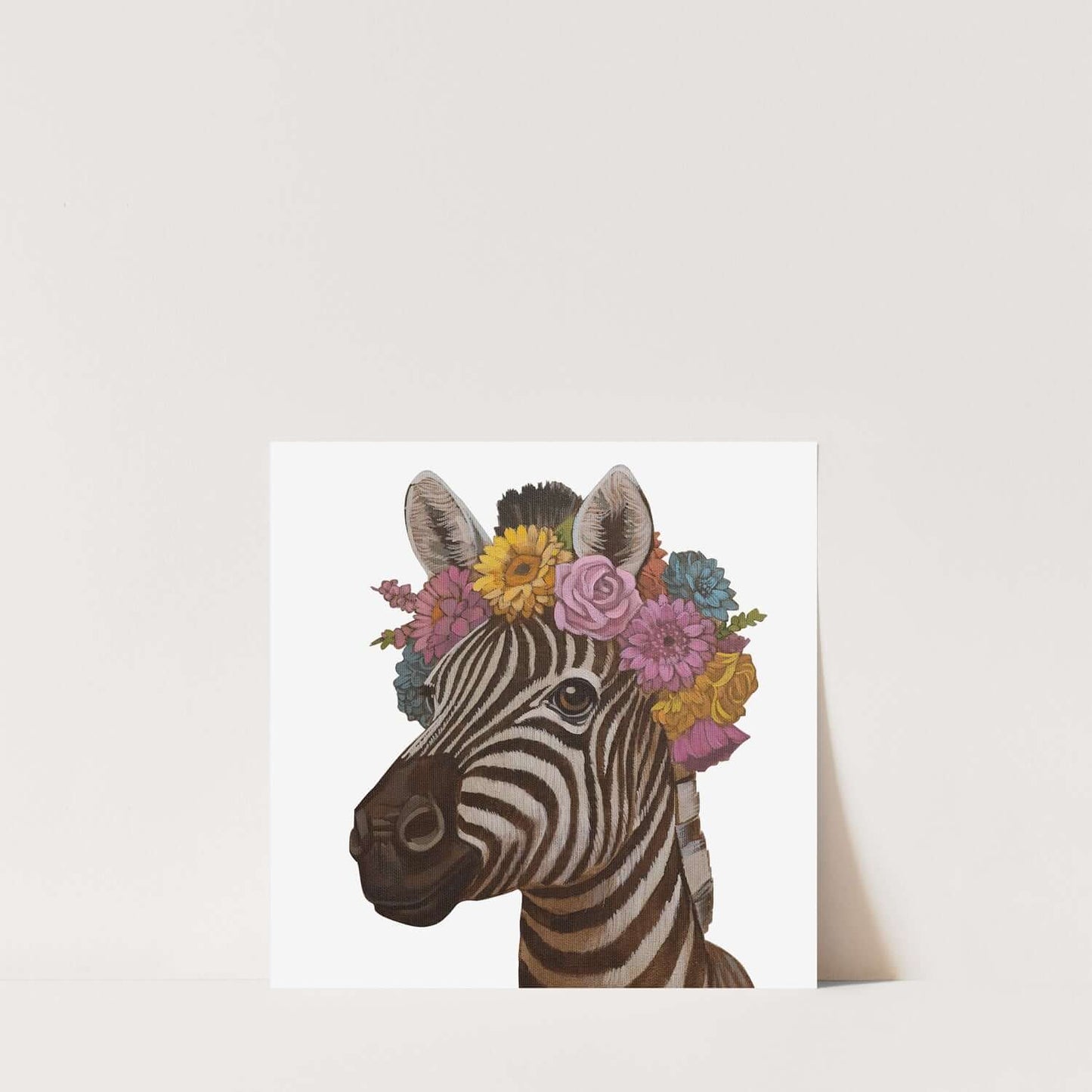 Print of a zebra with a floral crown on natural white eco paper, available in 20x20 cm and 25x30 cm sizes.