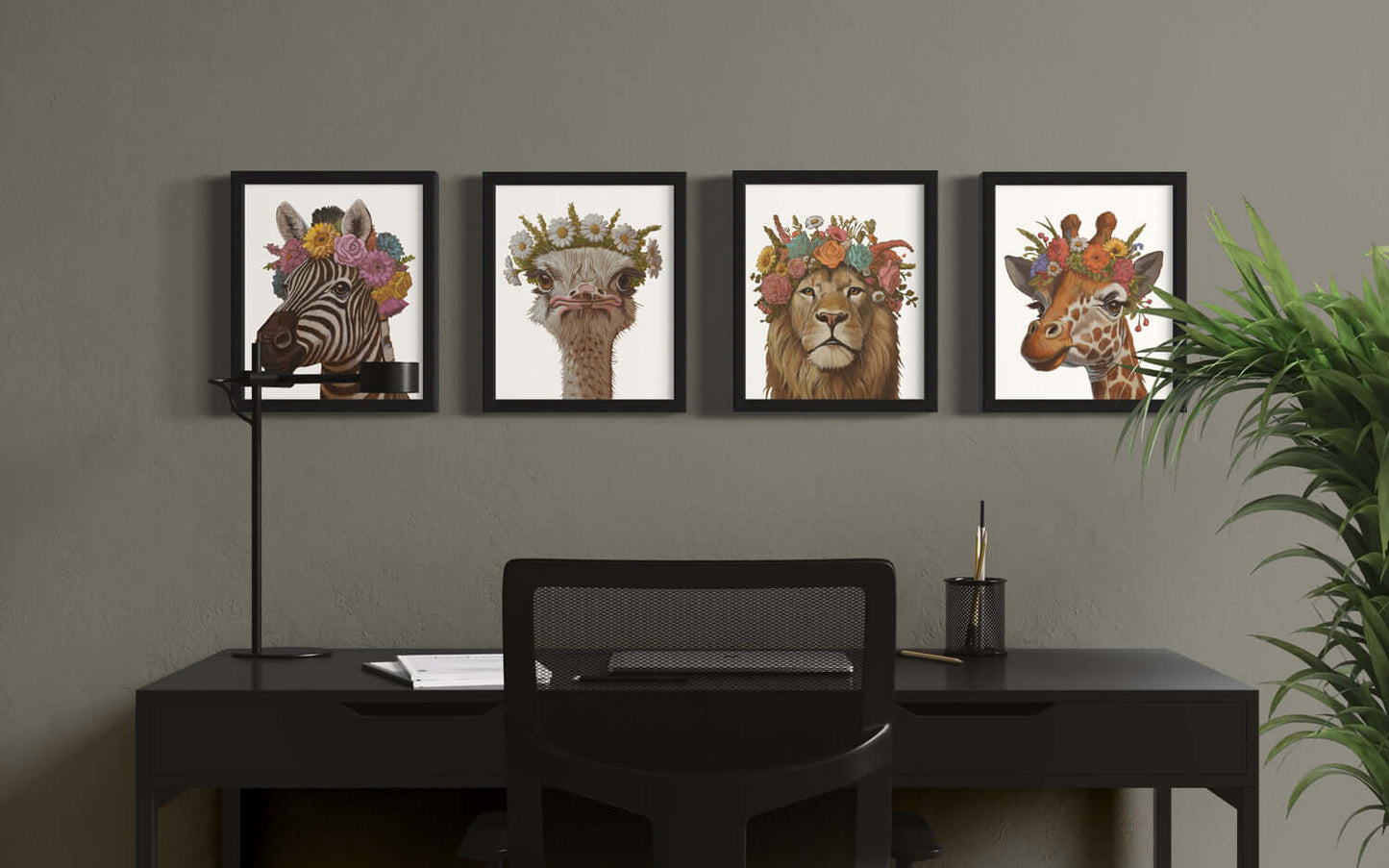 Framed animal prints featuring a zebra, giraffe, lion, and other creatures with floral crowns in a stylish workspace.