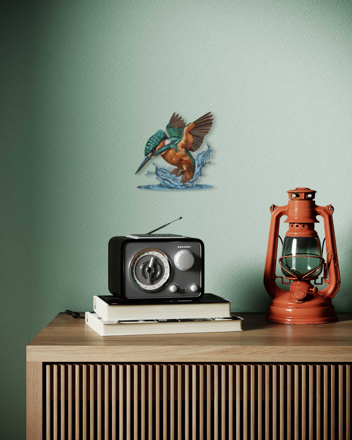 Retro hand-painted kingfisher art on MDF board, styled in a cozy room with radio and lantern.