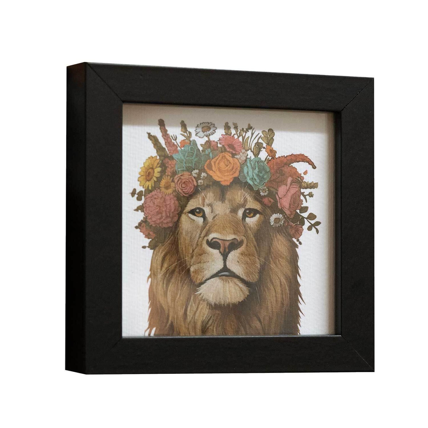 Framed fine art print of a lion with a floral crown, perfect for brightening up spaces.