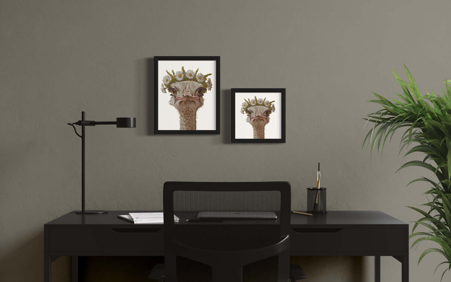 Blumenkind Nandu prints in black frames above a stylish desk, featuring nature-inspired artwork.