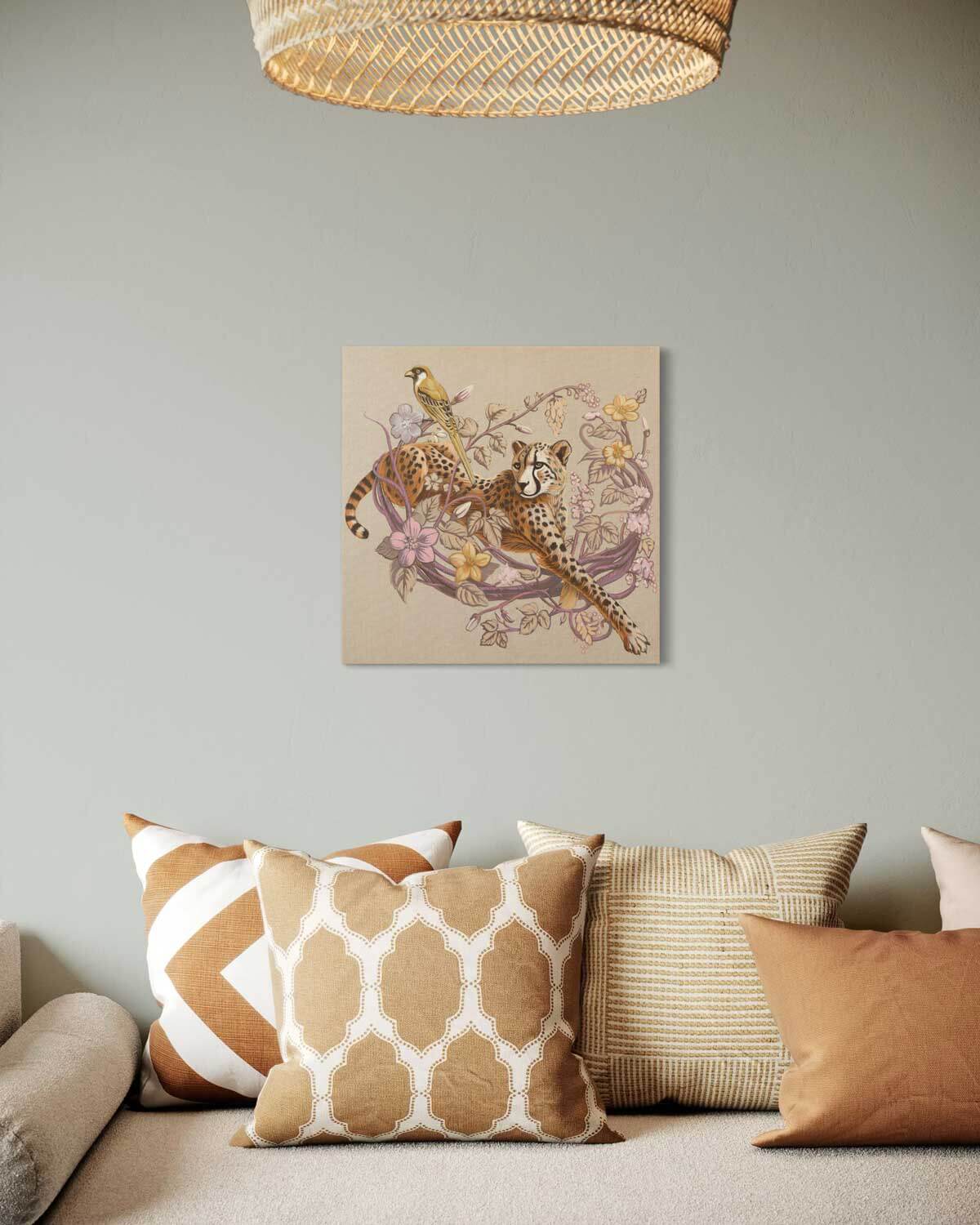 Original hand-painted 50x50 cm acrylic painting of a cheetah with a bird, elegantly displayed in a modern living room.