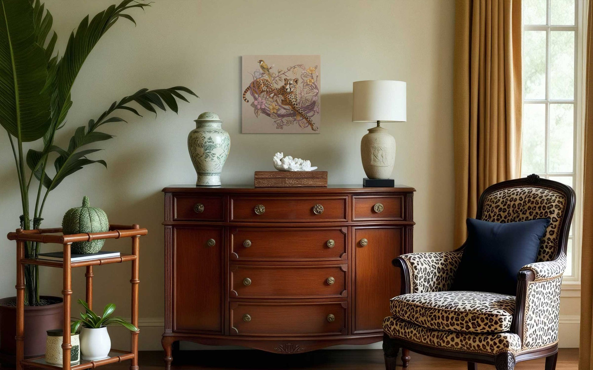 Elegant living room featuring a wood dresser, decorative lamp, and tropical plants with a stylish wall art piece.