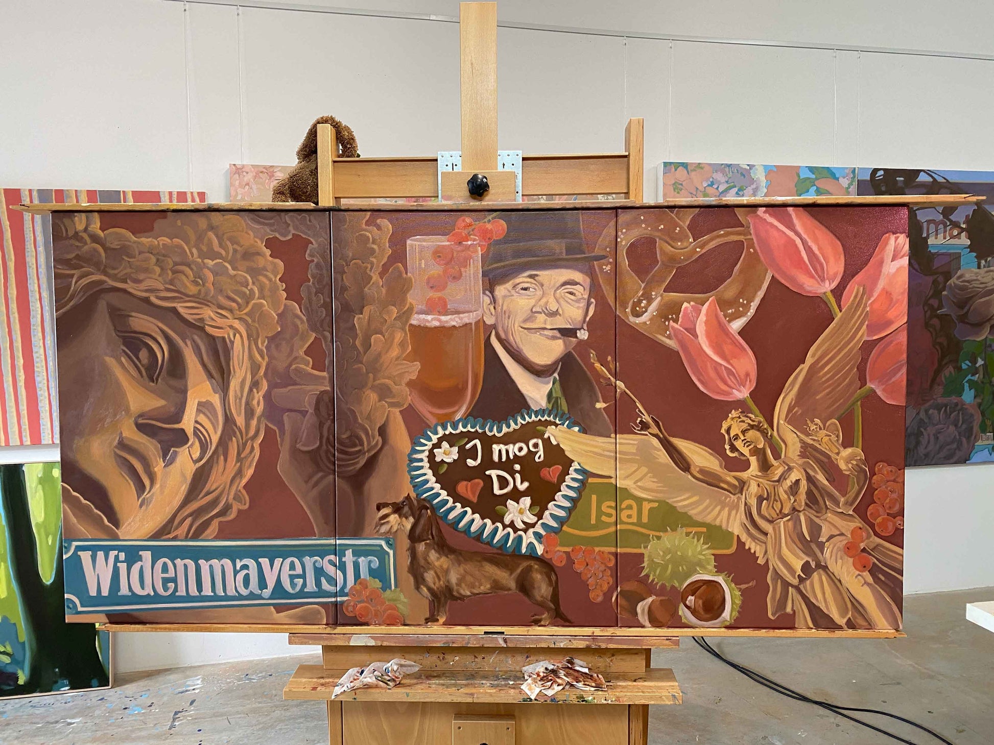 Hand-painted triptych featuring Munich culture, including icons and memories, with a heartfelt "I mog Di" message.